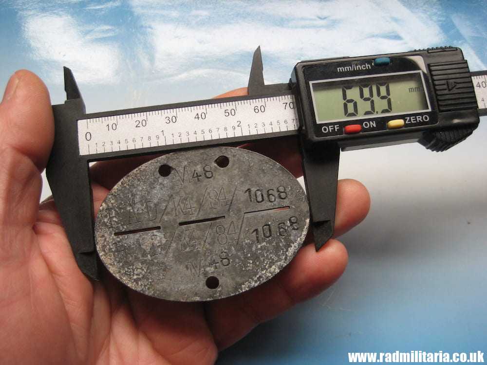 & WW2 original German DOG TAG - ID DISC from metal detecting. M48 RAD/K4/84/1068. - Image 7