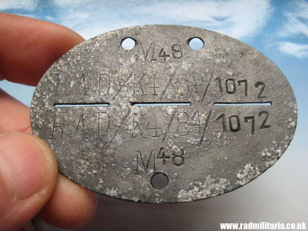 & WW2 original German DOG TAG - ID DISC from metal detecting: M48 RAD/K4/84/1072. - Image 2