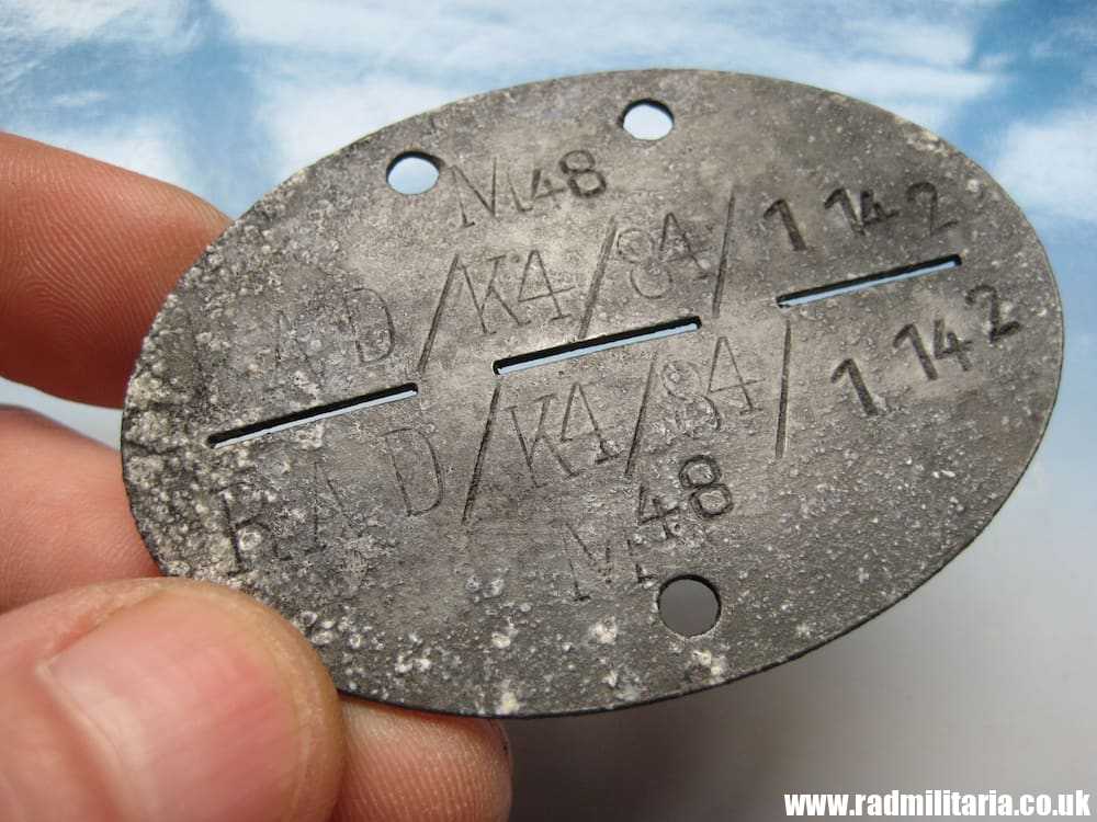& WW2 original German DOG TAG - ID DISC from metal detecting: M48 RAD/K4/84/1142.