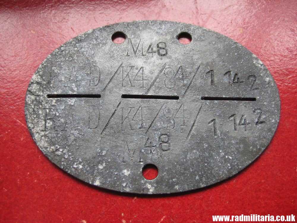 & WW2 original German DOG TAG - ID DISC from metal detecting: M48 RAD/K4/84/1142. - Image 10