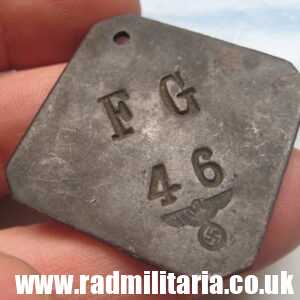& unknown German DOG TAG with EAGLE - F.G. 46. FELD-GENDARMERIE ?? metal detecting.