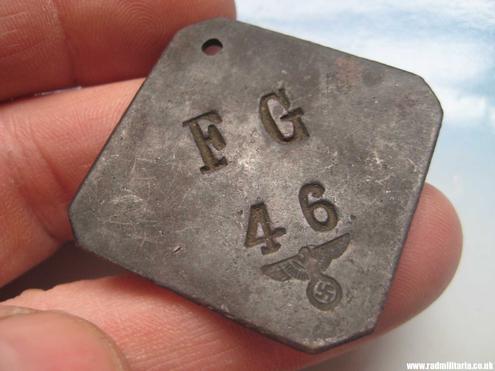 & unknown German DOG TAG with EAGLE - F.G. 46. FELD-GENDARMERIE ?? metal detecting.