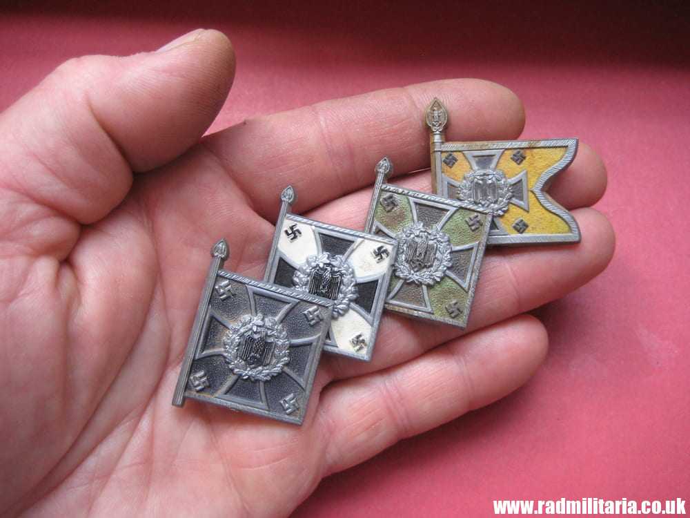 & WW2 SET of 4 German PLASTIC tinnie BADGES: WHW FLAGS - metal detecting find.