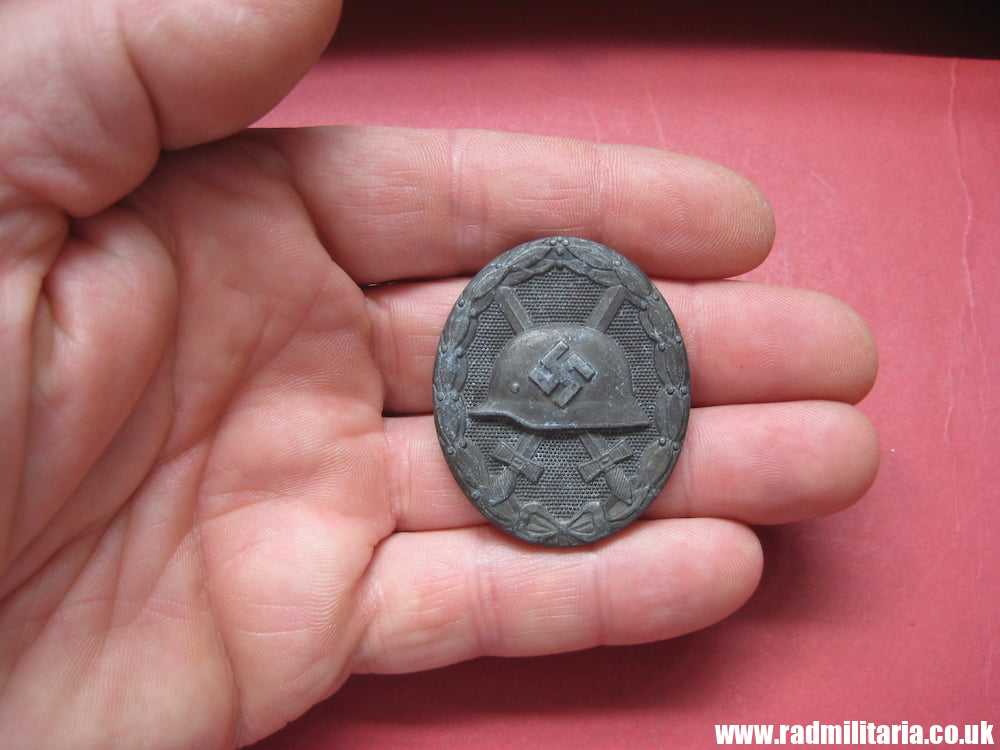 & WW2 German WOUND BADGE in Silver marked: "30" in good used condition.