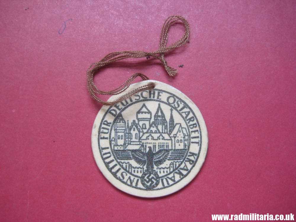 & unknown WW2 German CARDBOARD BADGE: Institut Fur Deutsche Ostarbeit Krakau. - Image 2