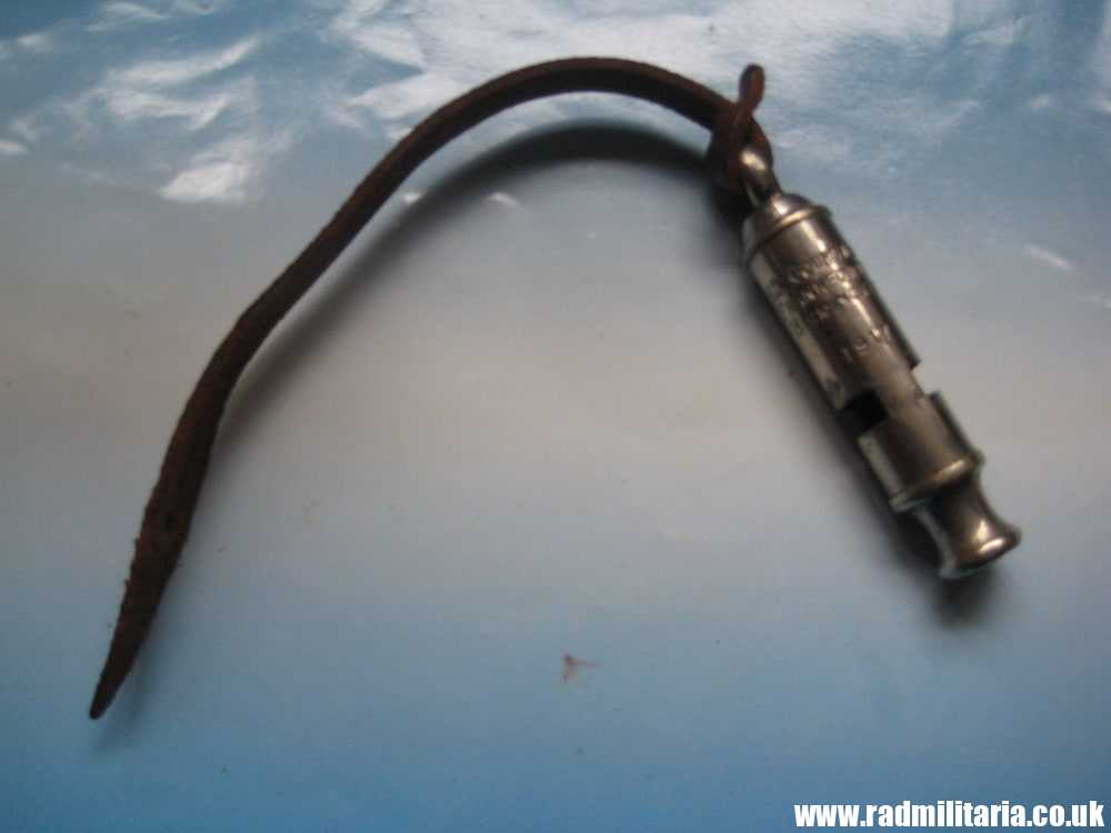 & WW1 original British MILITARY WHISTLE with date 1917 and leather strap: A De Courcy & Co BIRMINGHAM. - Image 2