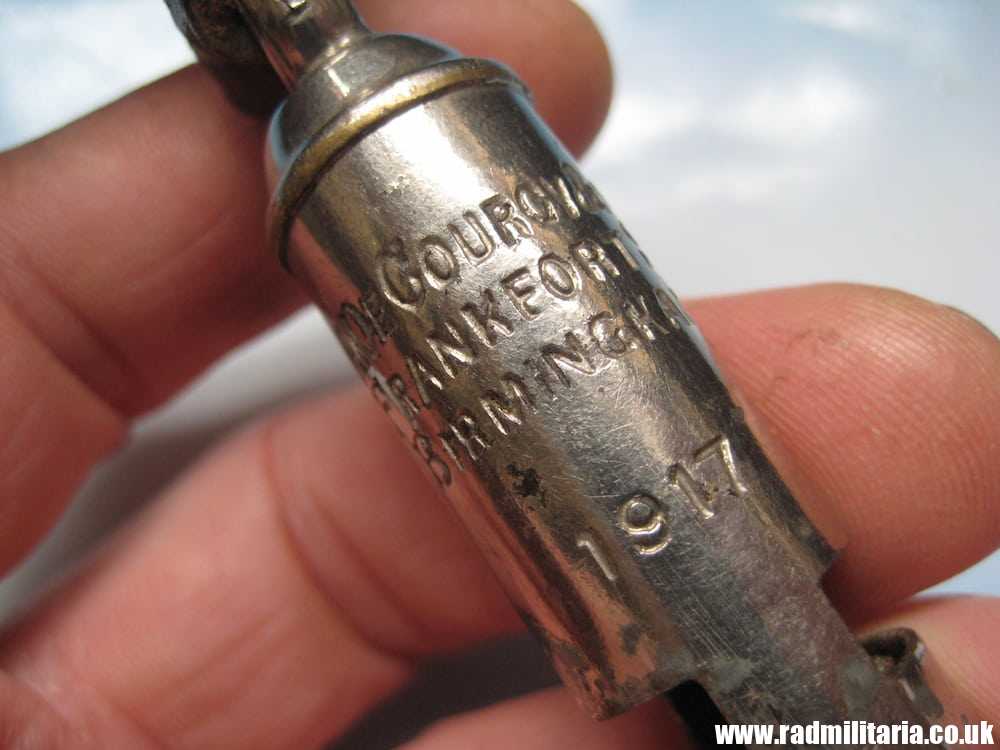 & WW1 original British MILITARY WHISTLE with date 1917 and leather strap: A De Courcy & Co BIRMINGHAM.