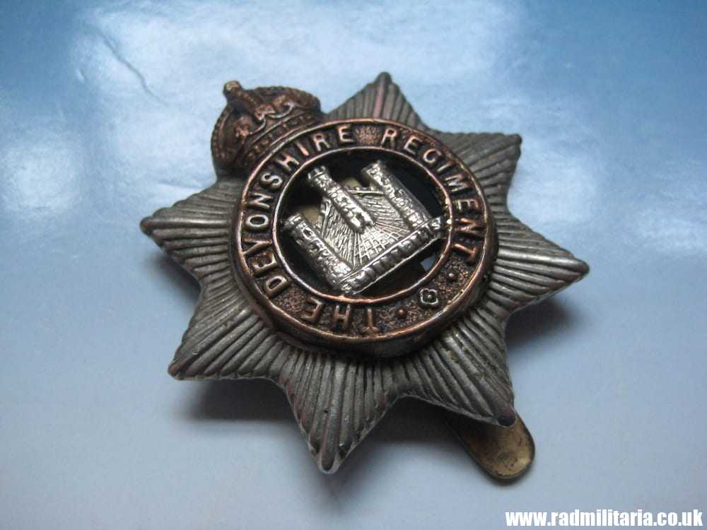 & WW1 original British CAP BADGE - Devonshire Regiment, maker: F.N B'HAM. - Image 5