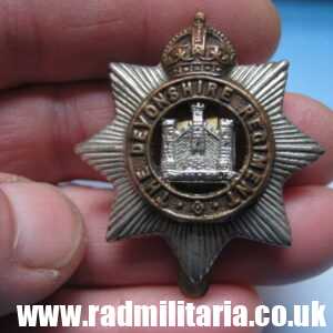 & WW1 original British CAP BADGE - Devonshire Regiment, maker: F.N B'HAM.