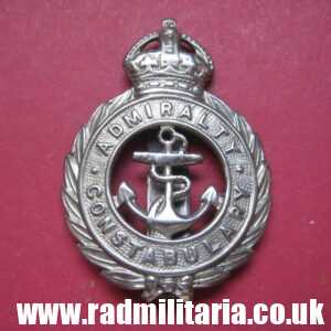 & post WW2 original British METAL BADGE - ADMIRALTY CONSTABULARY white metal cap badge..