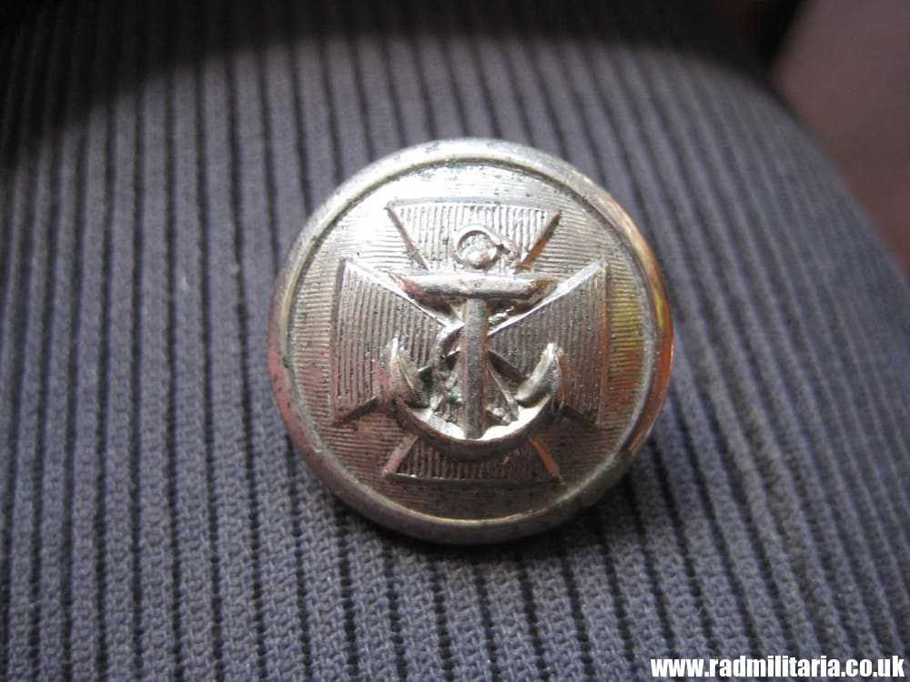 & unknown British TUNIC BUTTON maker: Stillwell & Son London. Navy? rare.