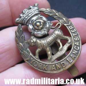 & WW1 British Regimental badge - CAP BADGE: York and Lancaster Regiment.