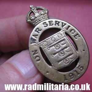 & WW1 original British metal BADGE 1915 - ON WAR SERVICE no. 57754, maker: J. A. Wylie & Co London Z.