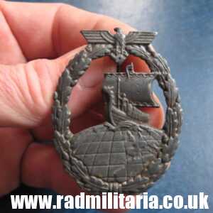 & original German KRIEGSMARINE Auxiliary Cruiser BADGE maker: "R.S." - R. Souval Vienna.