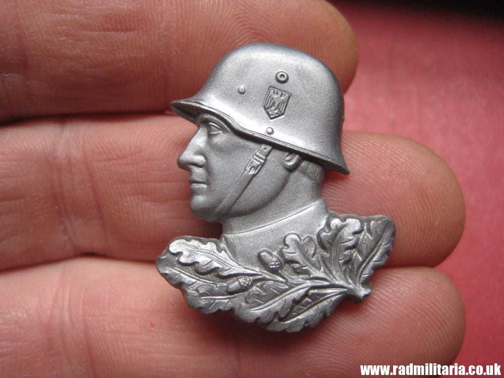 & WW2 German PLASTIC BADGE: Wehrmacht SOLDIER'S HEAD with HELMET, silver color. - Image 2