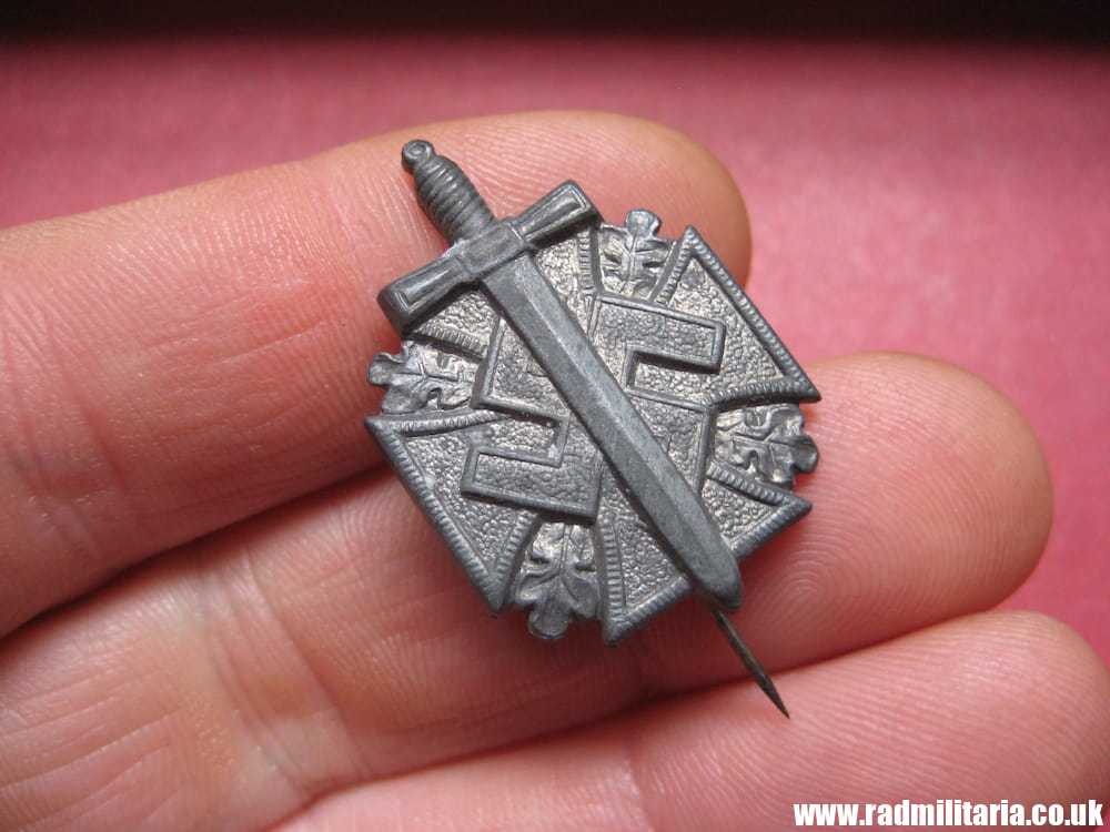 & WW2 small nazi GERMAN zinc BADGE with Iron Cross and swastika, maker: "35", very good condition.
