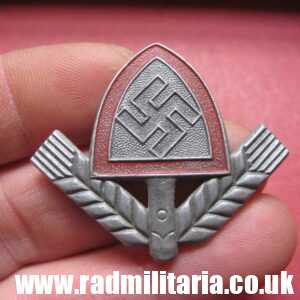& original WW2 RAD LABOUR CAP BADGE - maker: B&N 40 RADJ. GES - GESCH aluminum.