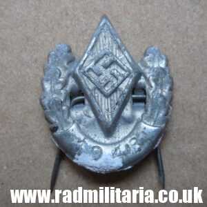 & original German HJ zinc BADGE with date - 1943.