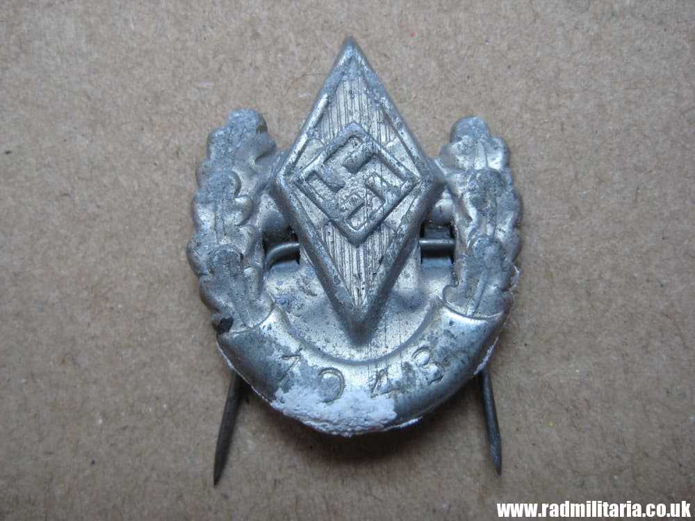 & original German HJ zinc BADGE with date - 1943.