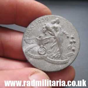 & WW2 original German TINNIE BADGE - 1 MAI 1939 SUDETENLAND, complete badge with maker mark.