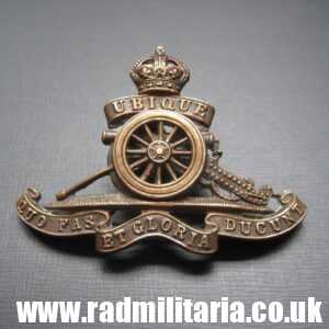 & WW1/WW2? British CAP BADGE: Royal Artillery officers bronze MOVING WHEEL cap badge - J.R. Gaunt.