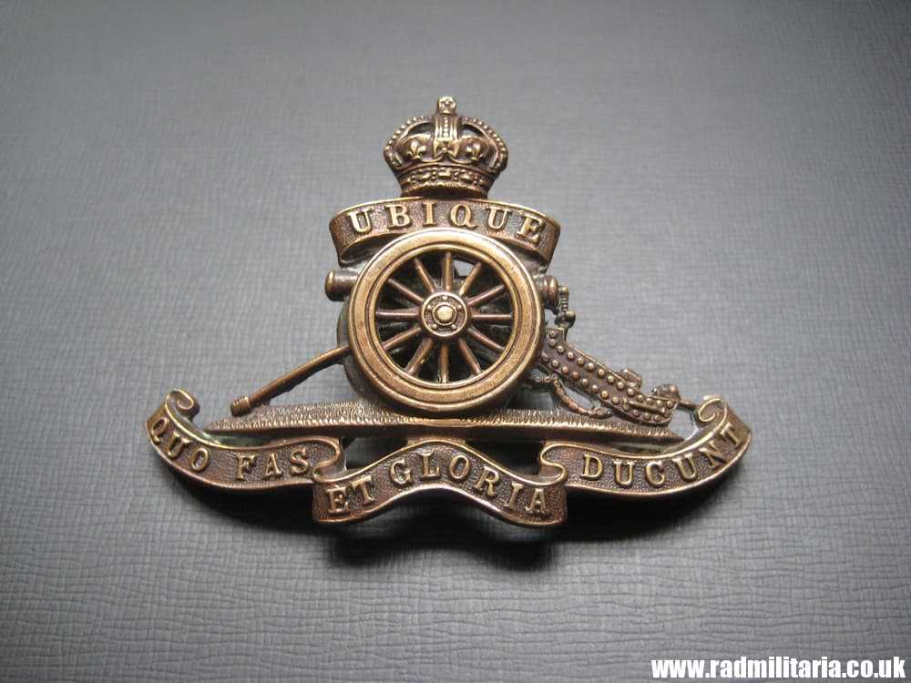 & WW1/WW2? British CAP BADGE: Royal Artillery officers bronze MOVING WHEEL cap badge - J.R. Gaunt.