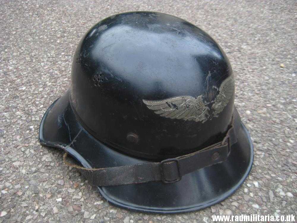 & original WW2 German steel helmet LUFTSCHUTZ "Gladiator" HELMET with liner.
