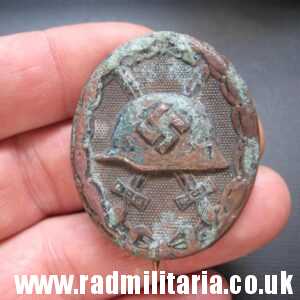 & WW2 original German WOUND BADGE in Black marked: "L11" - genuine, metal detecting find.
