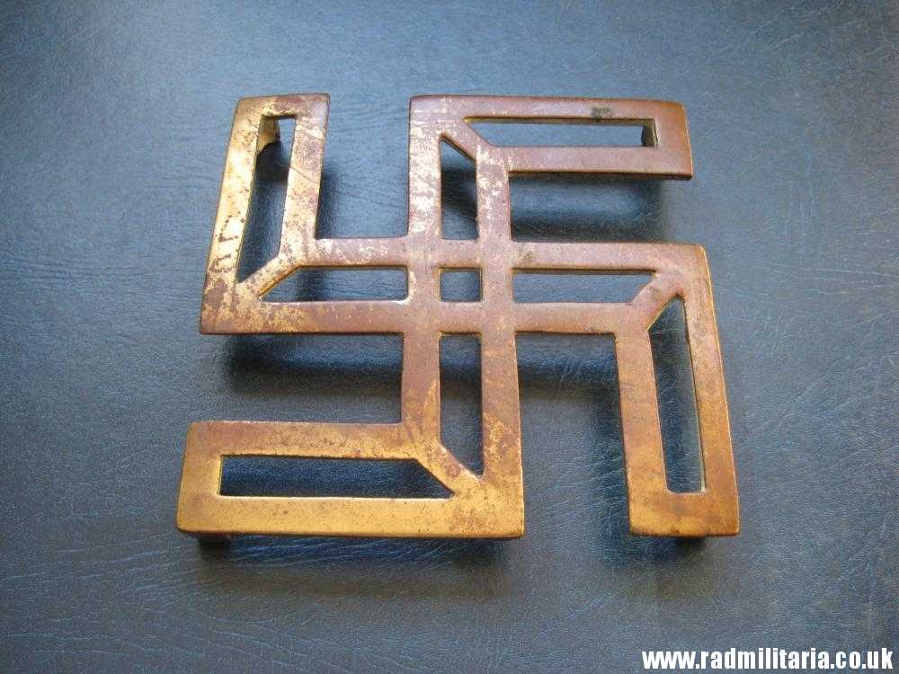 & unknown old brass IRON STAND with swastika.