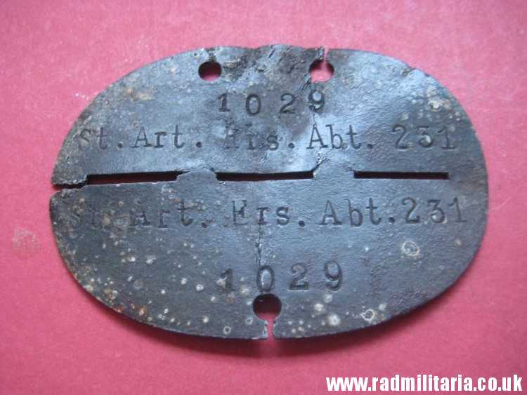 & original German DOG TAG – ID DISC in poor condition: 1029 St. Art. Ers. Abt. 231 - metal detecting find. - Image 2