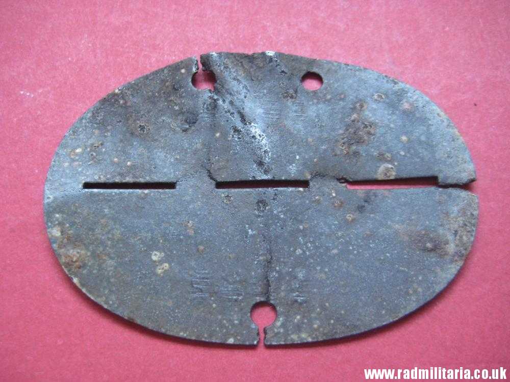 & original German DOG TAG – ID DISC in poor condition: 1029 St. Art. Ers. Abt. 231 - metal detecting find. - Image 6