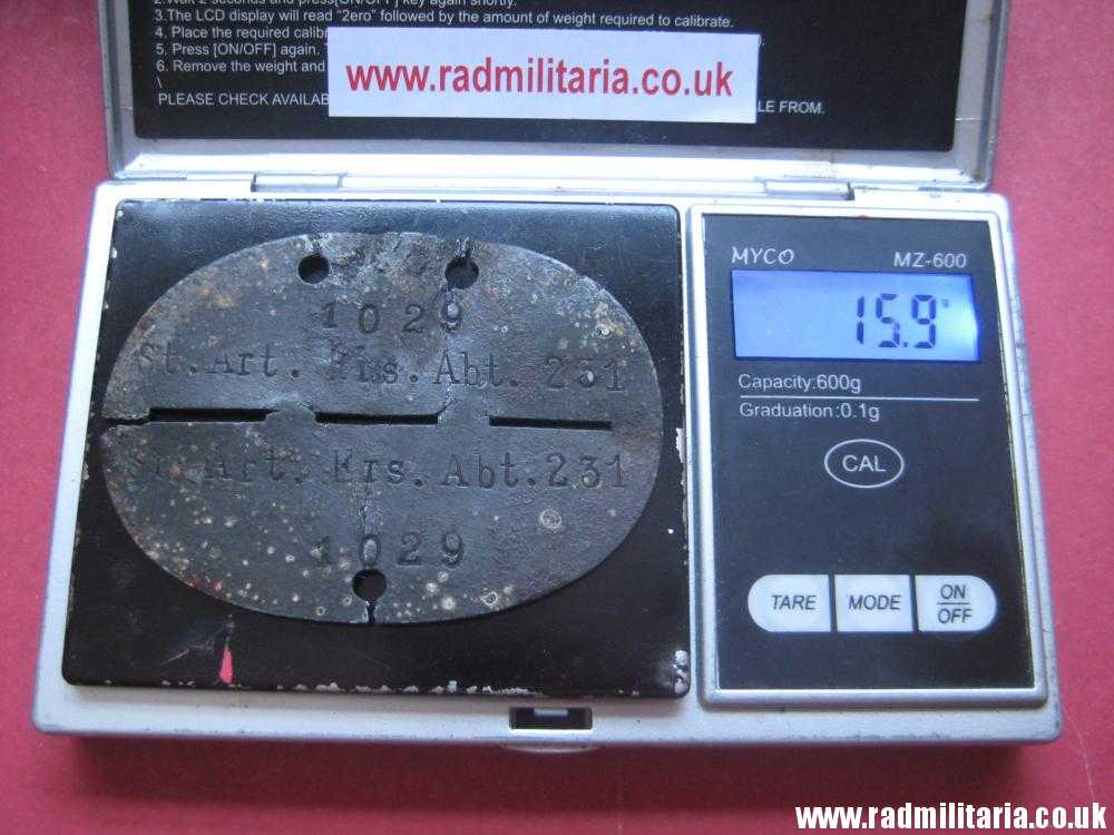 & original German DOG TAG – ID DISC in poor condition: 1029 St. Art. Ers. Abt. 231 - metal detecting find. - Image 9