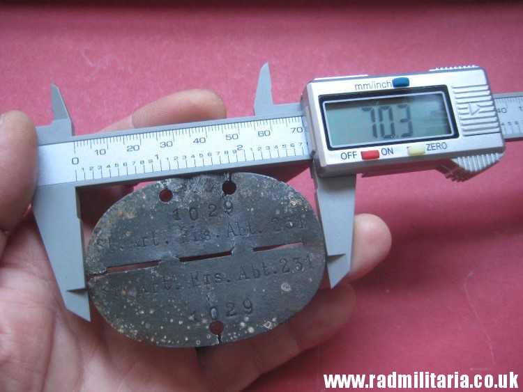 & original German DOG TAG – ID DISC in poor condition: 1029 St. Art. Ers. Abt. 231 - metal detecting find. - Image 7