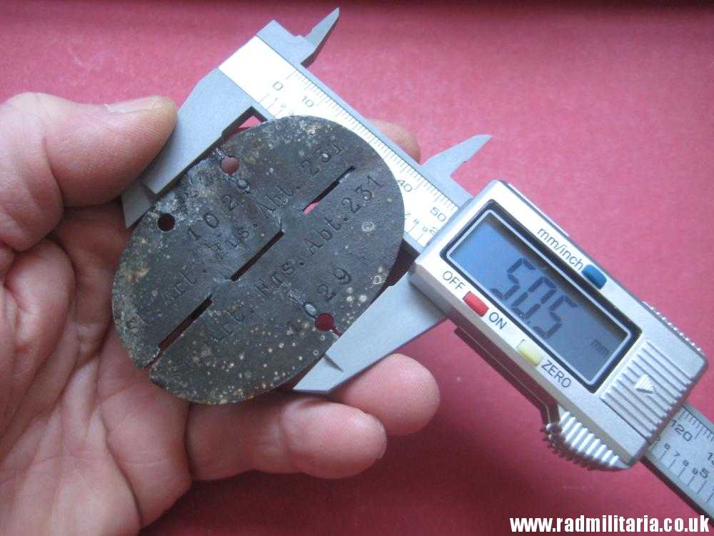 & original German DOG TAG – ID DISC in poor condition: 1029 St. Art. Ers. Abt. 231 - metal detecting find. - Image 8