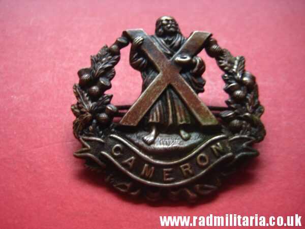 & WW1 Scottish badge: British Military Cap Badge Queen's Own Cameron Highlanders - genuine.