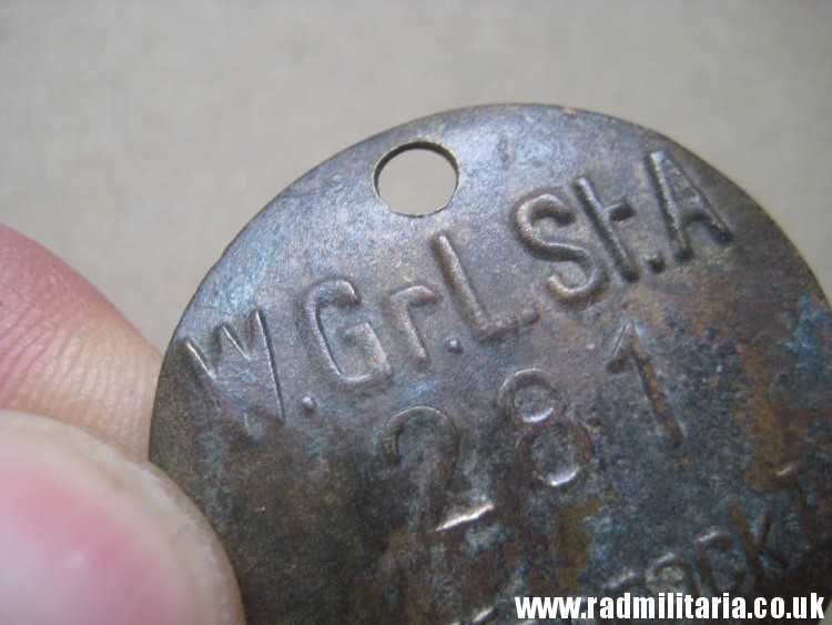& WW2 unknown German Wehrmacht uniform DOG TAG: "W.Gr.L.St.A 281 WAFFENROCK" - metal detecting find. - Image 9