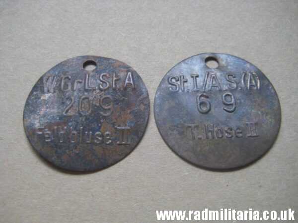 & WW2 unknown Wehrmacht uniform DOG TAGS - SET of 2: "W.Gr.L.St.A 209 Feldbluse II" & "St.I/A.S.(A) 69 T.Hose II" - Image 2