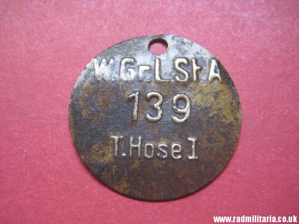 & WW2 unknown German Wehrmacht uniform DOG TAG: "W.Gr.L.St.A 139 T.Hose I" - metal detecting find. - Image 2