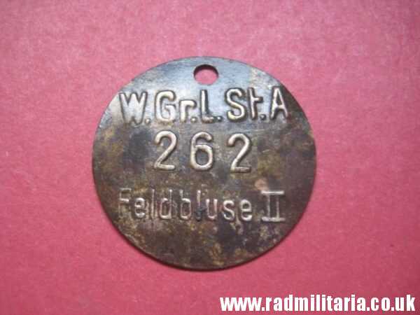 & WW2 unknown German Wehrmacht uniform DOG TAG: "W.Gr.L.St.A 262 Feldbluse II" - metal detecting find. - Image 2