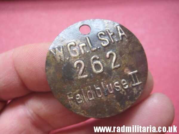 & WW2 unknown German Wehrmacht uniform DOG TAG: "W.Gr.L.St.A 262 Feldbluse II" - metal detecting find.