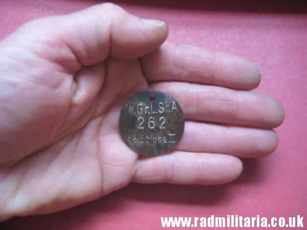 & WW2 unknown German Wehrmacht uniform DOG TAG: "W.Gr.L.St.A 262 Feldbluse II" - metal detecting find. - Image 7