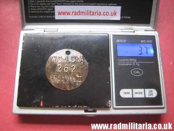 & WW2 unknown German Wehrmacht uniform DOG TAG: "W.Gr.L.St.A 262 Feldbluse II" - metal detecting find. - Image 9