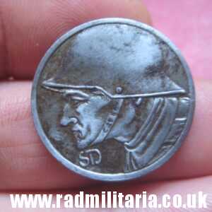 & ONE original German iron COIN from WW1: date 1918, German helmet.