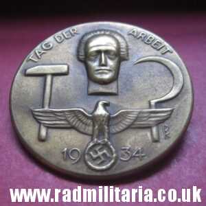 & pre WW2 original nazi GERMAN BADGE - Tag Der Arbeit 1934 with maker marks: "1 SCHW. GMUND"