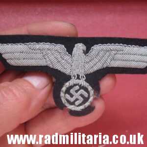 & German Wehrmacht embroidered silver EAGLE BADGE - original or fake?