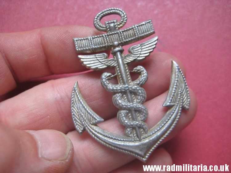 & original German KRIEGSMARINE BADGE made of aluminum.