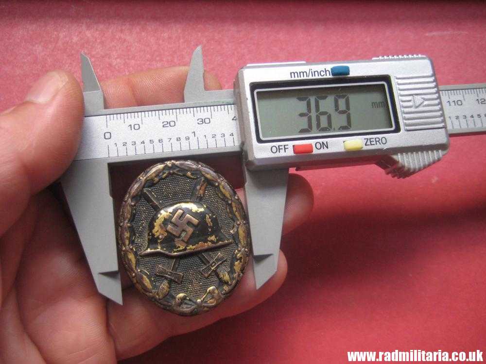 & WW2 original German WOUND BADGE in BLACK - made of brass, metal detecting find. - Image 13