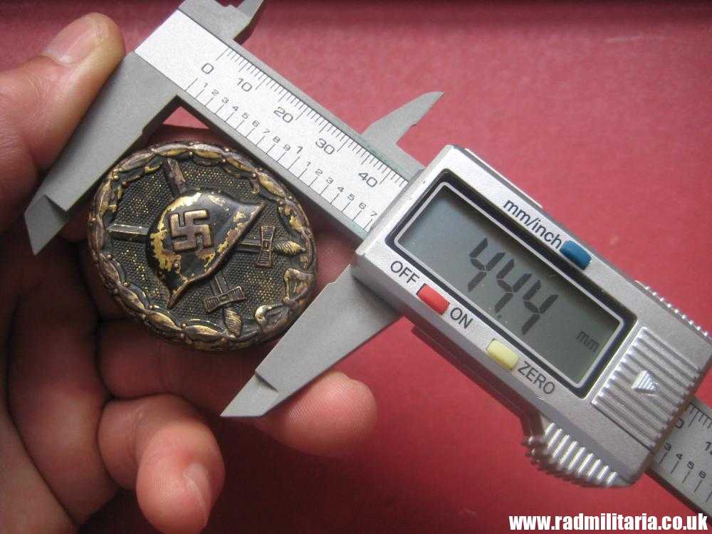 & WW2 original German WOUND BADGE in BLACK - made of brass, metal detecting find. - Image 14