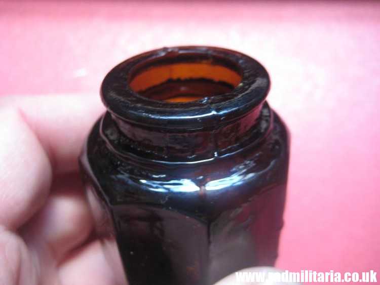 & unknown old brown color GLASS BOTTLE with SKULL - metal detecting find. - Image 9