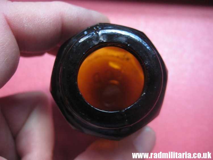 & unknown old brown color GLASS BOTTLE with SKULL - metal detecting find. - Image 11